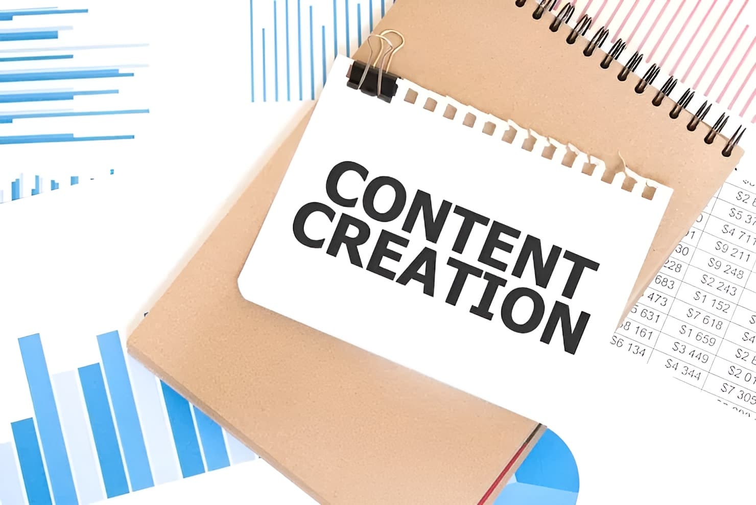 A colorful logo being designed on a tablet.